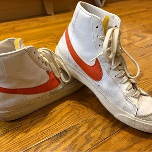 White and Orange Nike Blazers